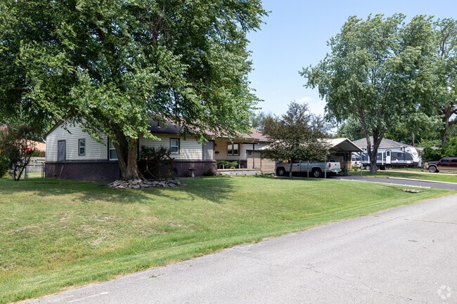 Mature trees line the streets of Clarland Acres.