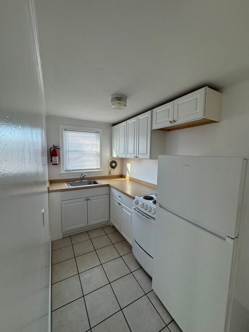 142 Cayuta St unit 202, Corning, NY 14830 - photo 1