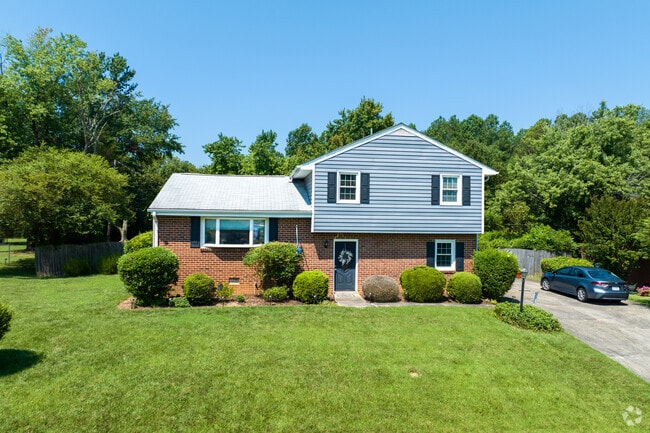 Split-level homes with side-yard driveways reside in Ettrick.