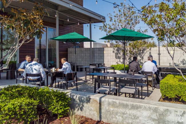 Enjoy outdoor dining at Shop@First Shopping Mall nearby Alviso.