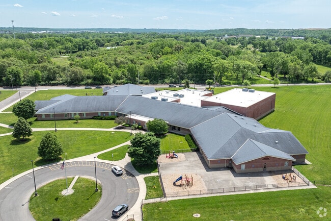 Teachers greet students with smiles each day at Louise Troy Elementary.