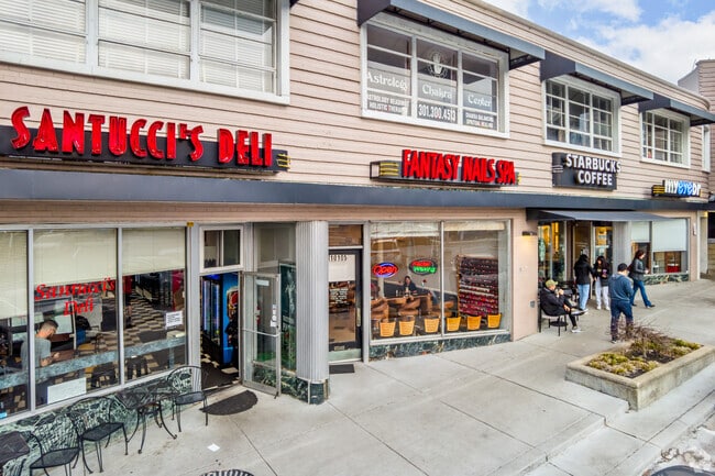 Sidewalks in South Four Corners connect residents to nearby shops and dining.