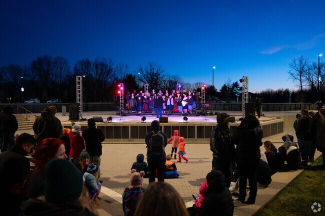 The adult choir sings as the sun sets on the Westfield in Lights festival.