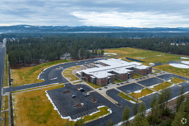 Mouintainside Middle School has a large parking lot in front of the school.