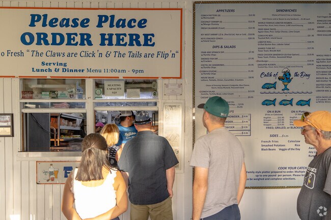 Locals and tourists alike flock to Keys Fisheries in Marathon, FL for those amazingly fresh seafood and great spirits.