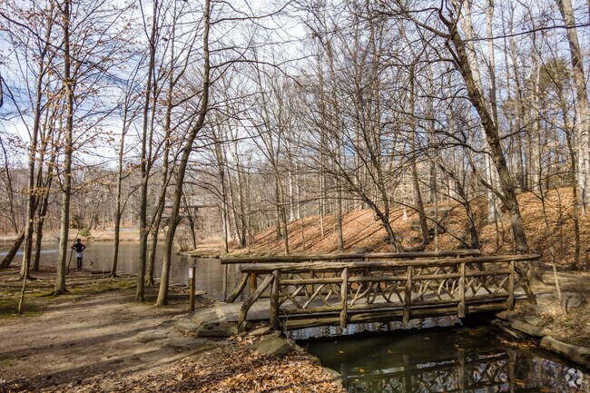 Winkler Botanical Preserve in Alexandria West includes a mountain lodge surrounded by woods.