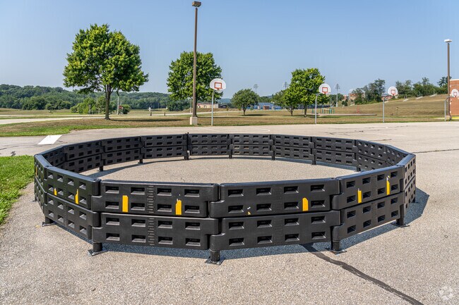 Spring Grove Area Intermediate School's parking lot features a gaga pit.