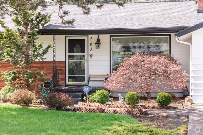 Well kept front yard and porch in Glenfair.