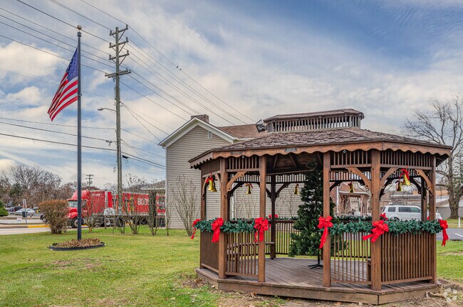 A gazebo on a corner in Allison Park decorated for the holidays.