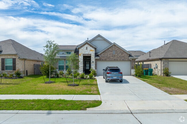 New traditional homes in La Marque attract young families seeking coastal living.