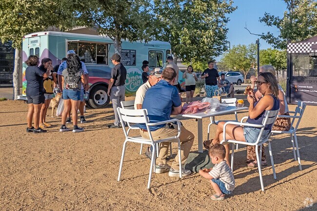 Families gather for dinner at the Tesoro Viejo Farmers Market.