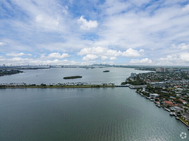 An opening view of Keystone Point Bay with the Miami skyline nearby.