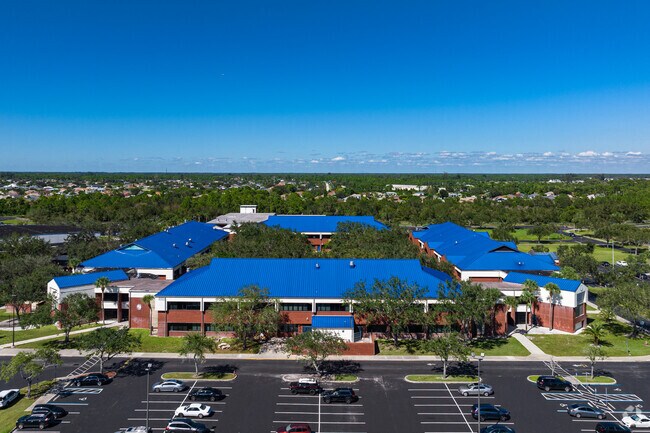 Lehigh Senior High School features multiple classroom buildings with a central atrium.