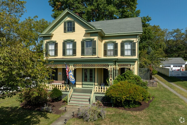 Historic homes like this revival style add variety to the many style of homes that Clinton has to offer.