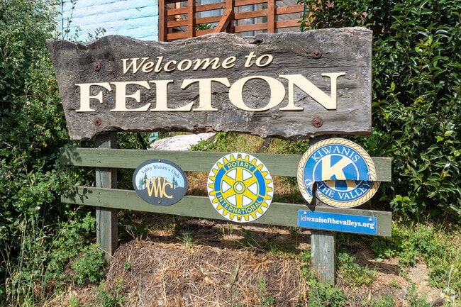 The rustic “Welcome to Felton” sign greets visitors with woodsy charm, marking the start of a peaceful redwood retreat in the Santa Cruz Mountains.
