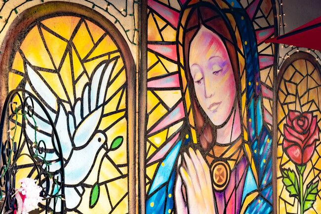 Storefronts in Uptown Whittier offer beautiful sights sounds and goods like this mural.