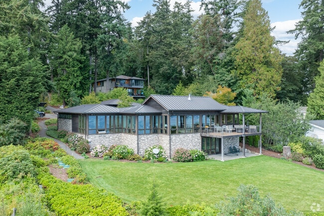 Madrono Park homes along the waterfront sit on larger lots and often have access to the shore.