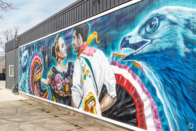 3Sixty commissions artists to paint colorful murals in the Rosa Parks Green neighborhood.