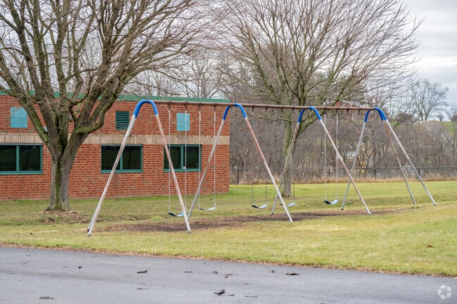 Recess at Trinity North Elementary School leads the way to swinging on the swing set.