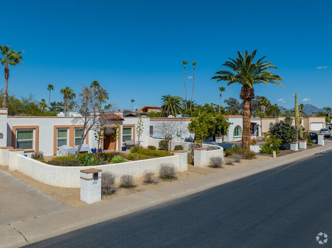 Single family homes sit safely behind sidewalks in Paradise Valley.