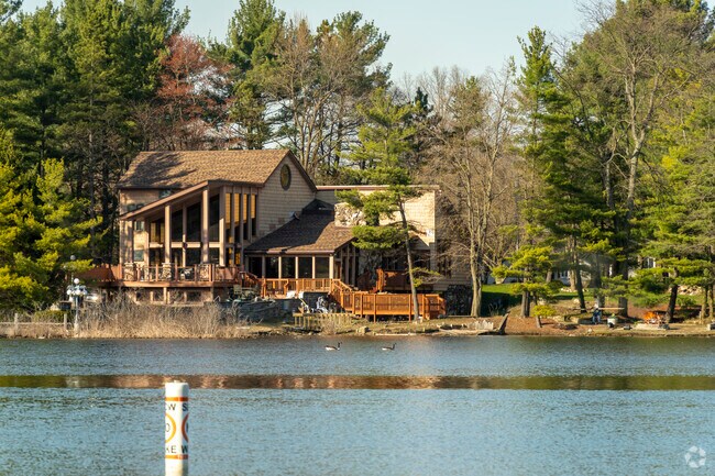 Stunning, architecturally detailed Craftsman-style homes line the shores of Simonton Lake.