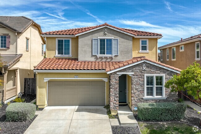 Spanish Colonial Revival homes can be found on all streets in Positano.