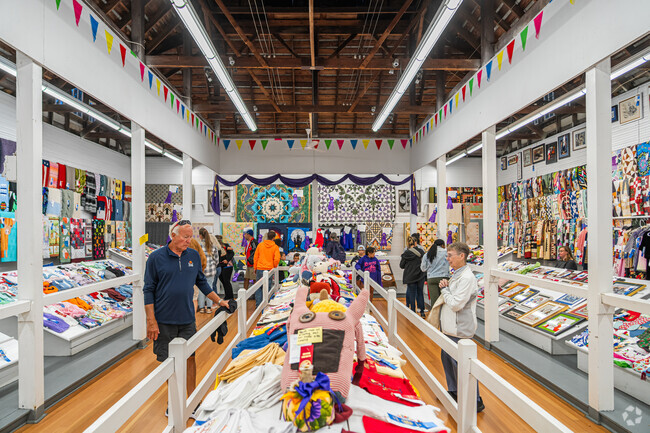 Marseilles shoppers browse crafts and home goods at the long-running Sandwich Fair.