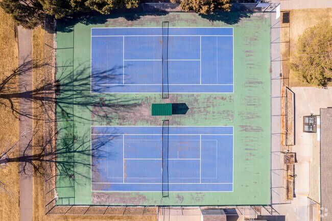 Village Green Park has a couple tennis courts for Willow Park's residents and visitors to enjoy.