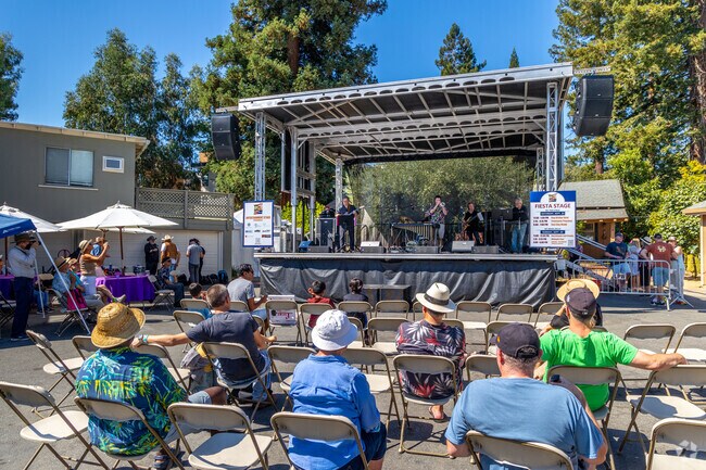 Many different bands perform at the Lafayette Art & Wine Festival near Trails.
