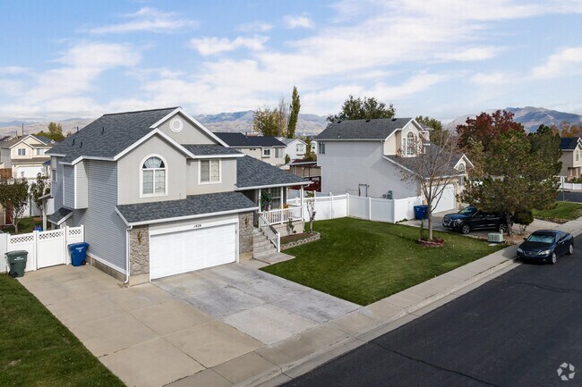 Beautiful two story homes line this street in Taylorsville.
