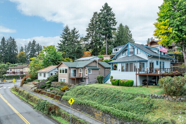 A row of large of homes with harbor views is seen in West Bay Drive.