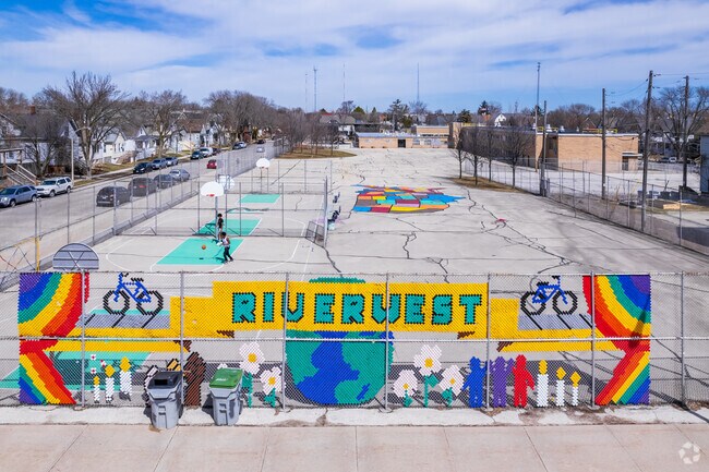 Colorful and vibrant neighborhood signage can be found throughout the Riverwest community.