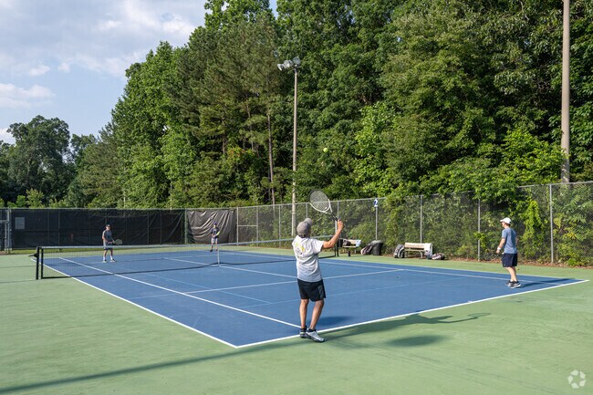 Hembree Park features tennis courts and baseball fields near Saddle Creek.