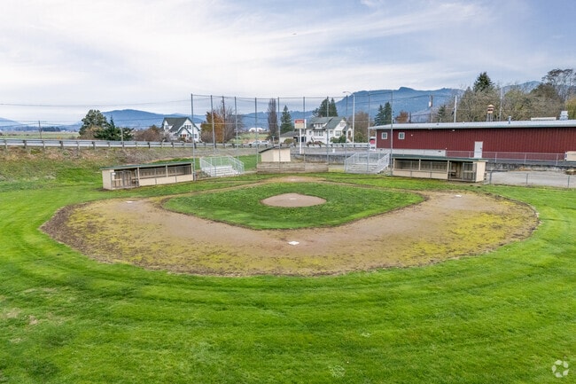 Meet up with friends for some batting practice on the baseball field at Conway Park.