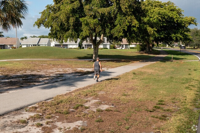 A jogger gets his cardio exercise in the Indian Spring neighborhood of Golf, FL.