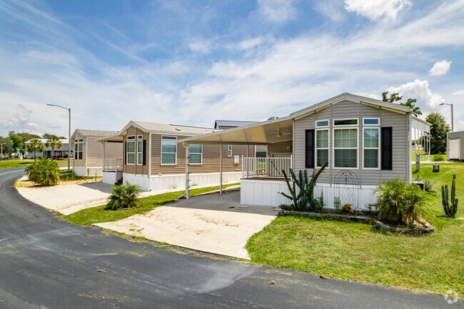 Rows of manufactured mobile homes offers affordable options in Lady Lake's Recreation Plantation RV Resort.