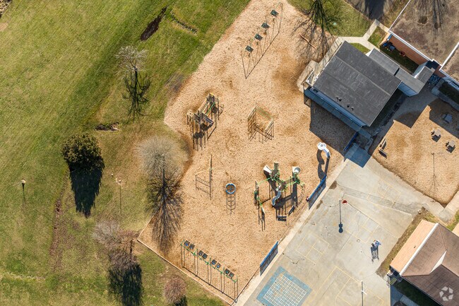 The younger kids at Greenwood Elementary School get their own, safe play area.