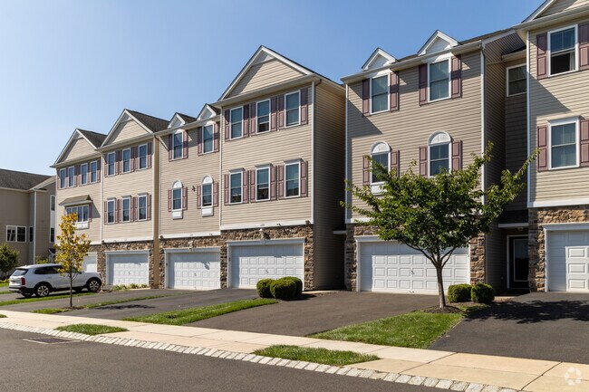 Townhomes in Neshaminy Valley have two-car garages and private driveways.