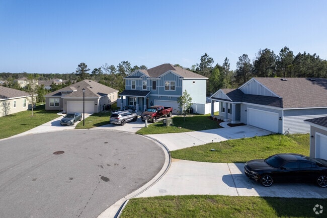 Cul-de-sac of newer homes in the Forest Trails neighborhood.