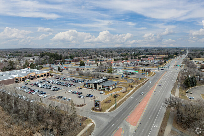 Hwy 96 W and Hodgson Rd intersect at the southwest corner of Snail Lake.