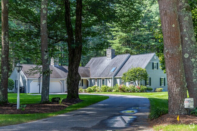 Cape Cod home with private driveway in the Wayland neighborhood.