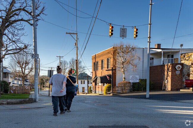 A couple of residents of  Georges Township Fayette take a stroll through town on a lovely sunny day.