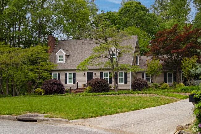 A French Colonial home adds to the neighborhood's charm in Jamestown.