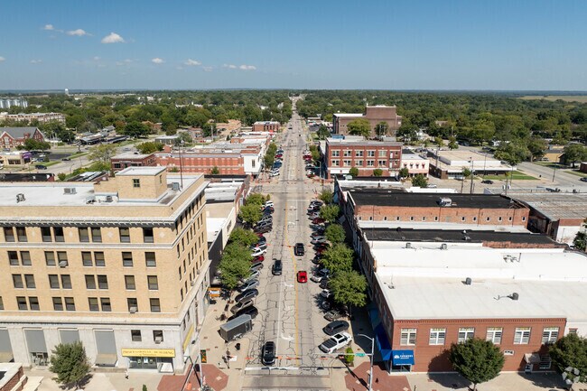 Historic red brick buildings line Main Street in Independence’s downtown district.