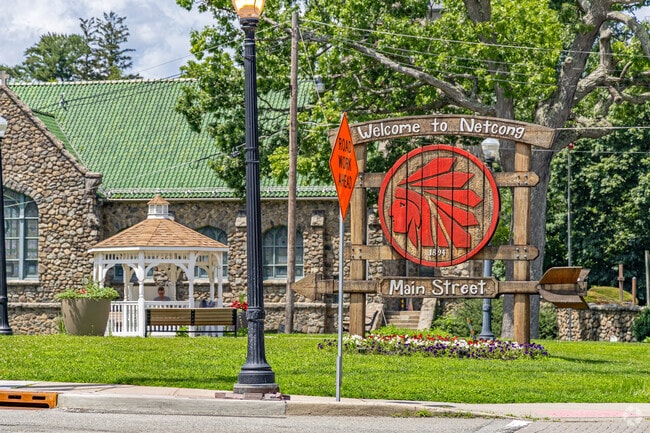 The hand-carved welcome sign on Netcong’s Main Street stands proudly beside the town gazebo, capturing the historic pride and small-town heart that define the community.