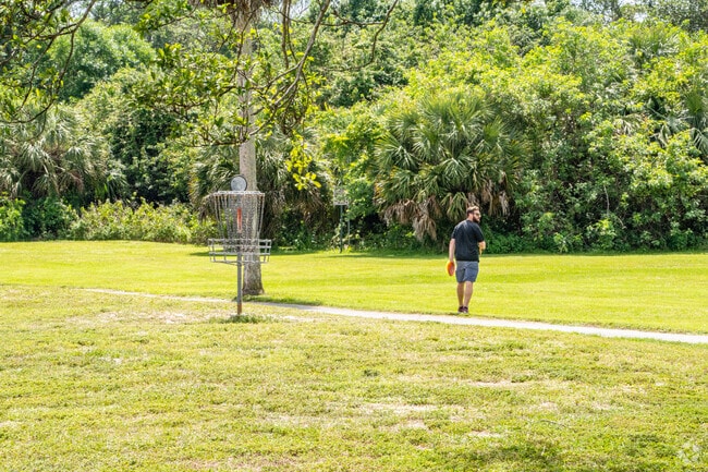 Practicing your swing at the freebie golf course in Palm Beach Farms.