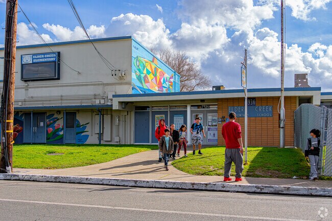 Eager students of Elder Creek Elementary meet parents after school in Glen Elder.
