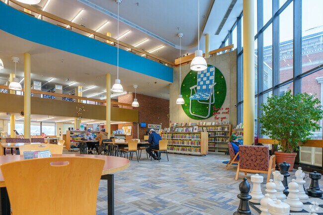 Play a game of life-sized chess, spend time reading, or engage in new learnings at the Fletcher Free Library near Centennial.