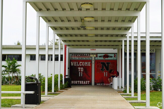 Northeast High School welcomes students through the central main entrance.
