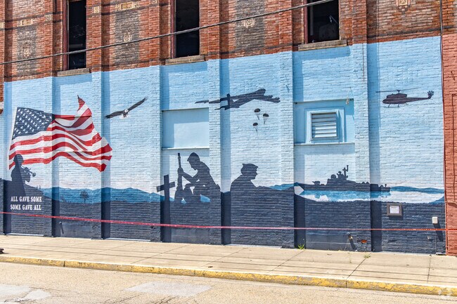 Residents honor the military with a giant mural near the center of Toronto.